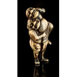 The Ronald Hart Collection of Japanese Netsukes - a carved ivory netsuke modelled as two demons