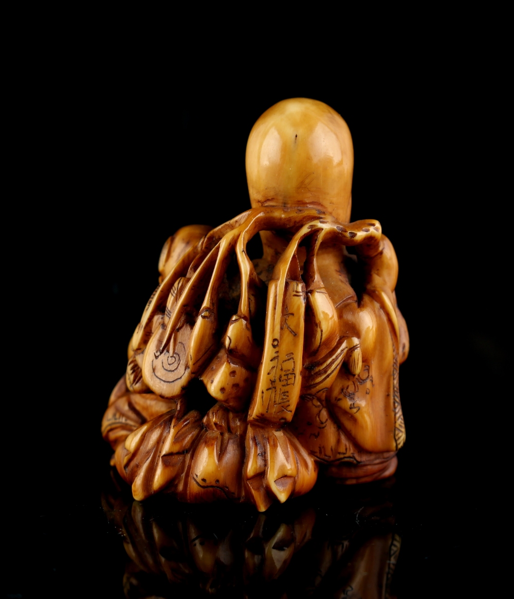 The Gill Collection of Japanese Netsukes - a carved ivory netsuke modelled as Fukurokuju with a boy, - Image 4 of 5