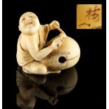 The Ronald Hart Collection of Japanese Netsukes - a carved ivory netsuke modelled as seated figure