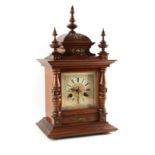 Property of a gentleman - a late 19th / early 20th century walnut cased mantel clock, Junghans two-
