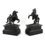 Property of a gentleman - a pair of late 19th century patinated bronze models of Marly horses, after
