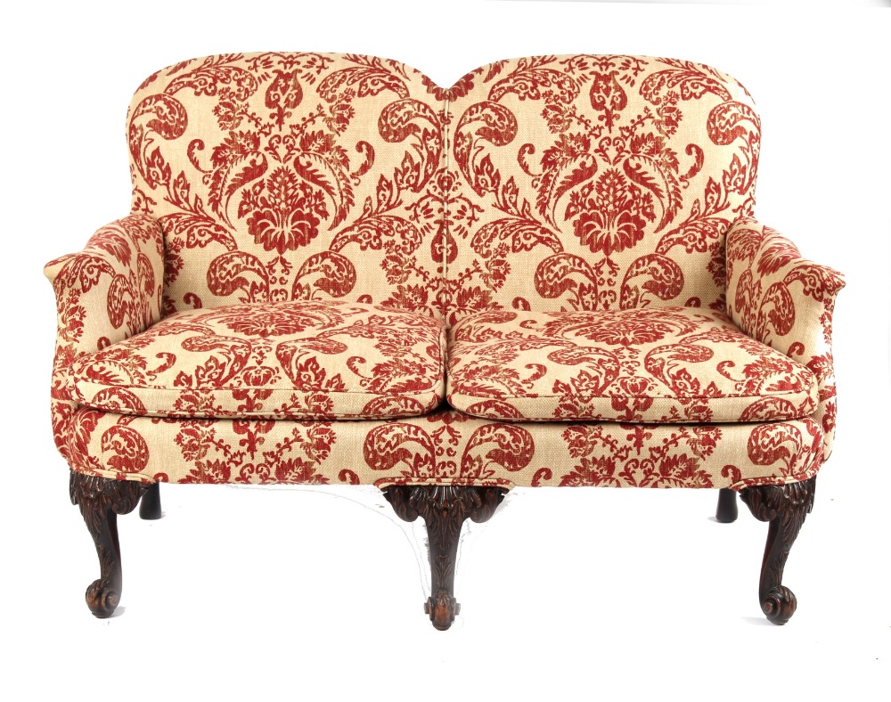 Property of a gentleman - a George II style two-seater sofa, second quarter 20th century, with red