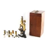 An early 20th century lacquered brass & black microscope, by C. Reichert, Wien, in fitted mahogany