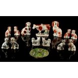 Property of a lady - a collection of ten Victorian Staffordshire models of seated spaniels,