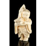 The Ronald Hart Collection of Japanese Netsukes - a carved ivory netsuke modelled as a boy