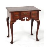 Property of a lady - a George II red walnut lowboy, circa 1750, with shaped frieze & cabriole legs