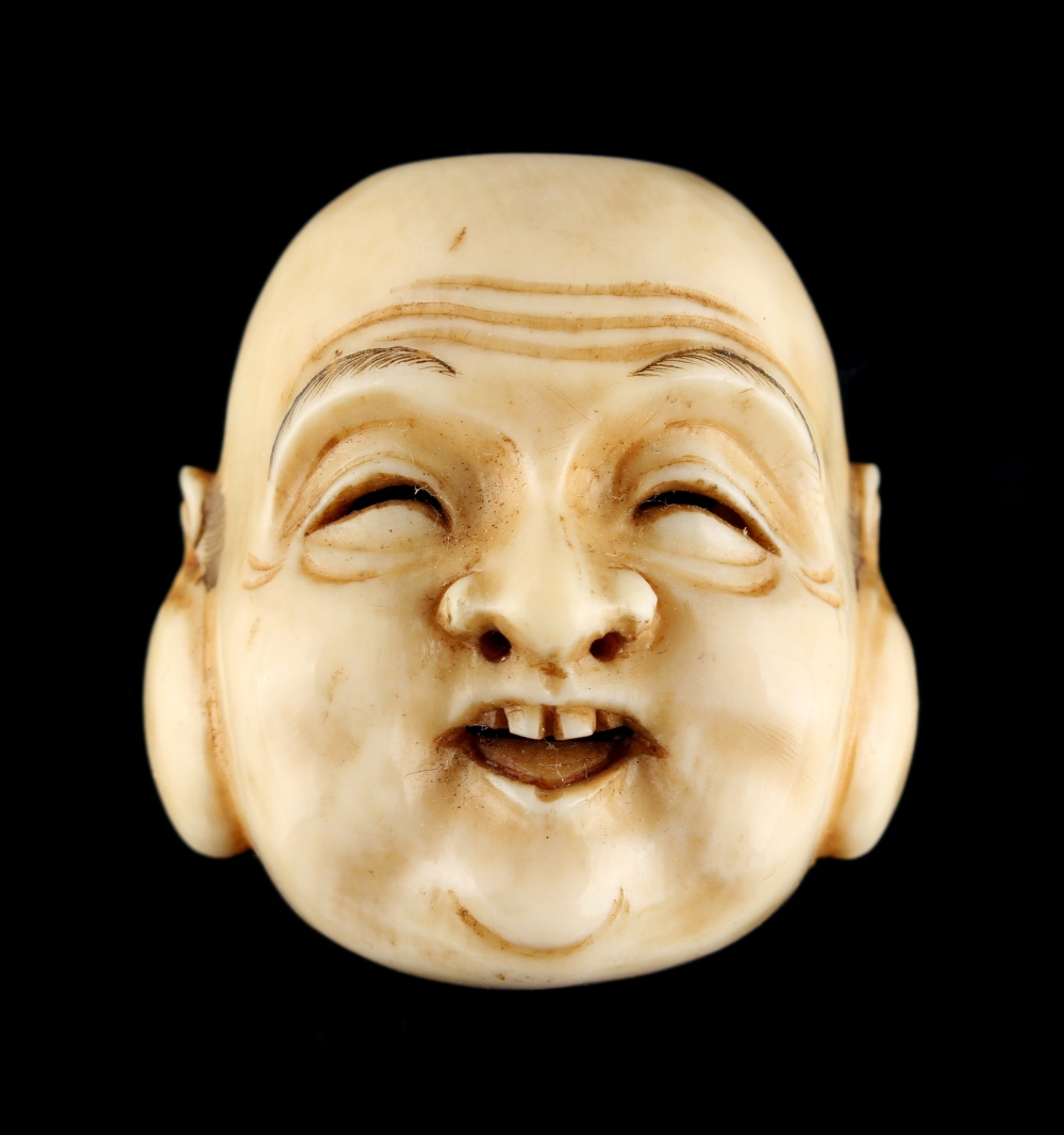 The Ronald Hart Collection of Japanese Netsukes - a carved ivory netsuke modelled as a mask of - Image 5 of 6
