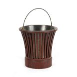 Property of a gentleman - an early 19th century George IV mahogany basket, the bars of rectangular
