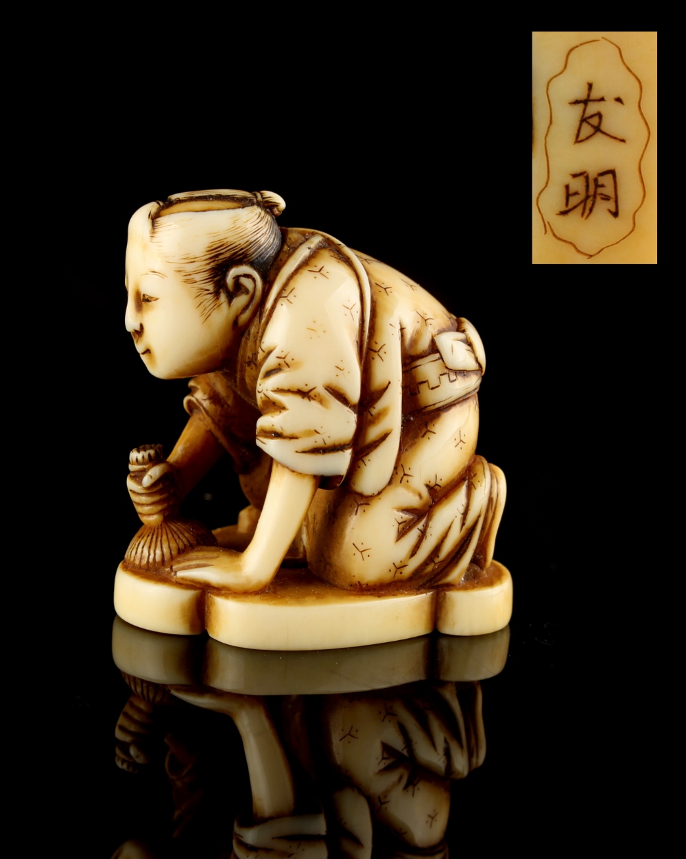 The Ronald Hart Collection of Japanese Netsukes - a carved ivory netsuke modelled as a kneeling