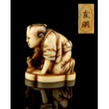 The Ronald Hart Collection of Japanese Netsukes - a carved ivory netsuke modelled as a kneeling
