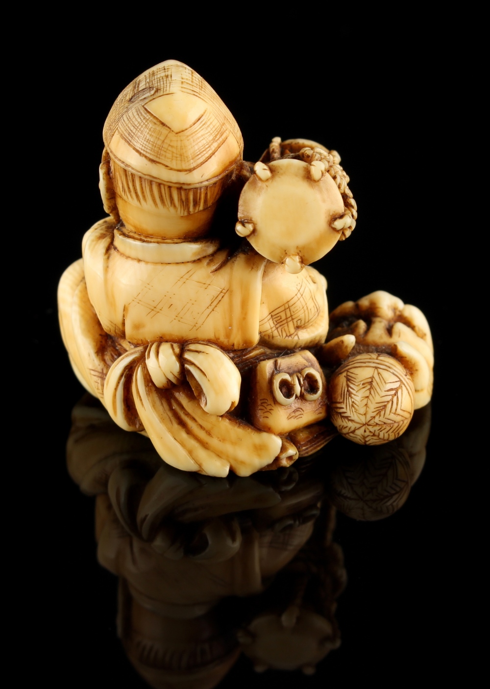The Ronald Hart Collection of Japanese Netsukes - a carved ivory netsuke modelled as a seated boy - Image 6 of 6