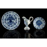 Property of a gentleman - two 18th century Delft blue & white plates, the larger 12ins. (30.5cms.)