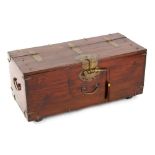 A Far Eastern brass mounted wooden trunk, probably early 20th century, the padlock modelled as a