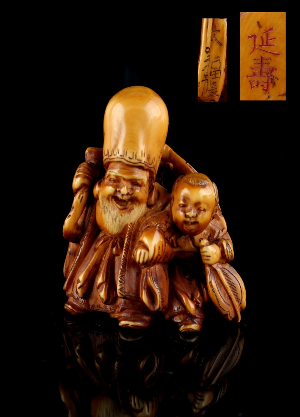 The Gill Collection of Japanese Netsukes - a carved ivory netsuke modelled as Fukurokuju with a boy,