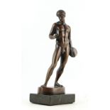 Property of a gentleman - a late 19th / early 20th century brown patinated bronze figure of a discus