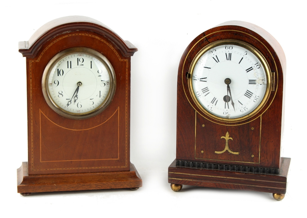 Property of a gentleman - a late 19th century rosewood & brass inlaid arched cased mantel clock