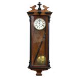A late 19th century walnut & ebonised cased Vienna regulator style wall clock, the enamel dial