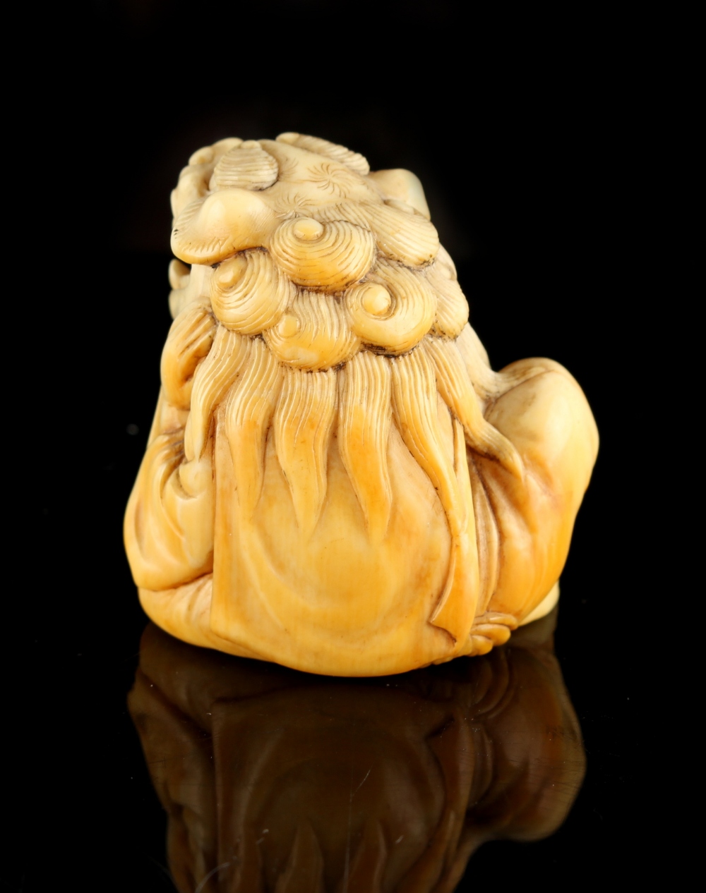 The Gill Collection of Japanese Netsukes - a carved ivory netsuke modelled as a seated boy - Image 5 of 6