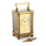 Property of a lady - an early 20th century French brass concave cased carriage clock timepiece, 4.