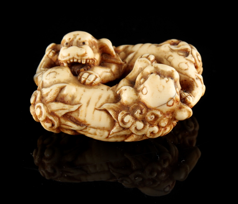 The Ronald Hart Collection of Japanese Netsukes - a carved ivory netsuke modelled as two recumbent - Image 3 of 4