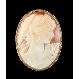 Property of a deceased estate - a 9ct gold mounted oval shell cameo brooch depicting a classical