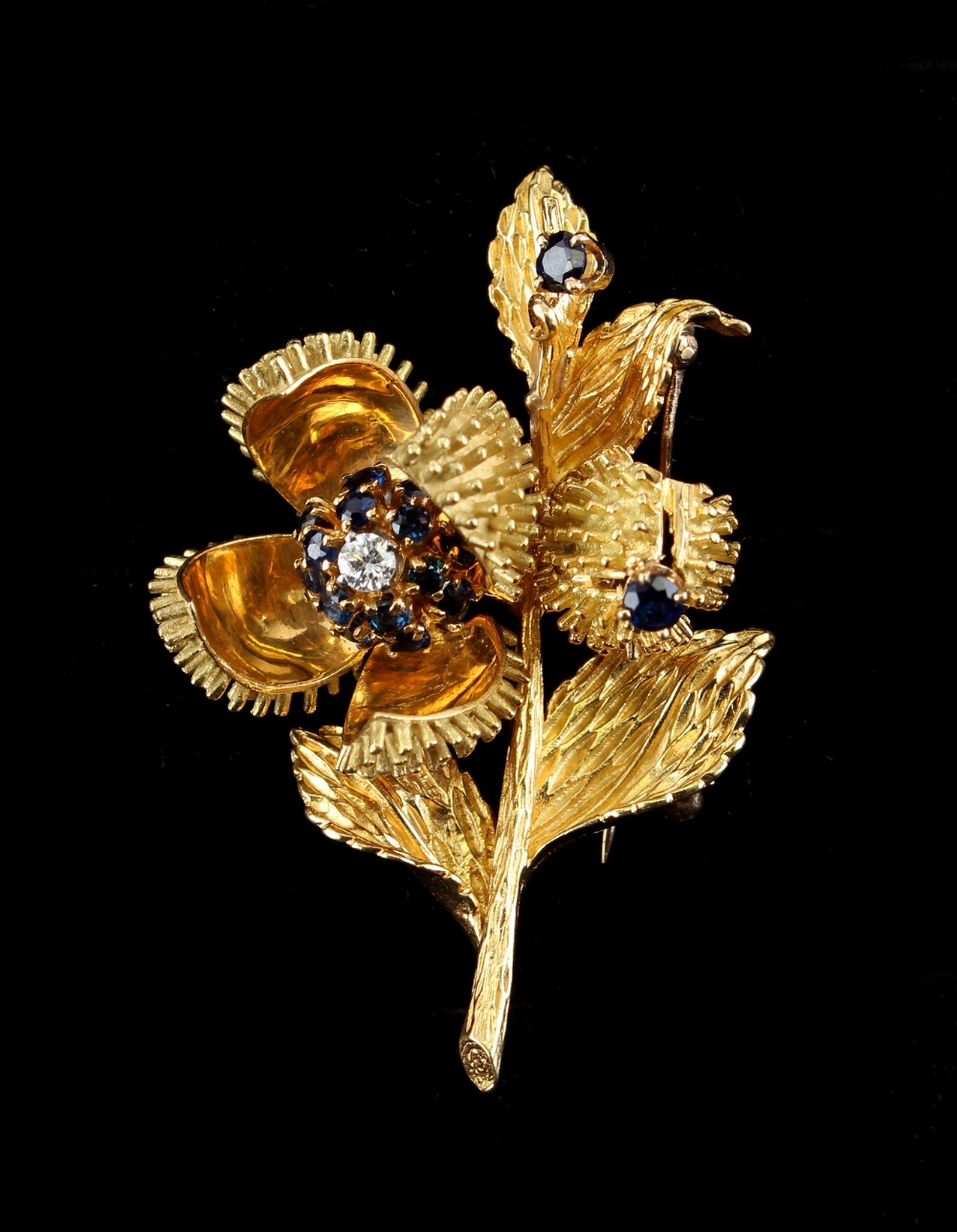 Tiffany - an 18ct yellow gold sapphire & diamond floral spray brooch, one flower with four hinged