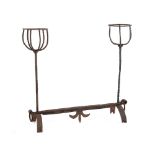 Property of a lady - a 17th century forged & wrought iron double ended andiron, with cresset