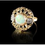 A Rudolf Feldman 14ct yellow gold opal & diamond ring, the circular setting with a round opal