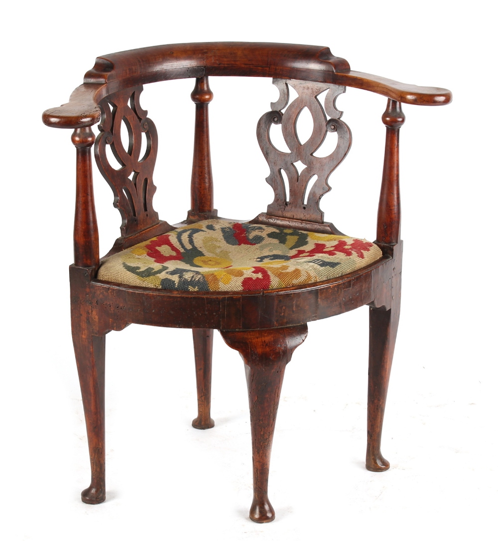Property of a gentleman - a George II fruitwood corner chair (see illustration).