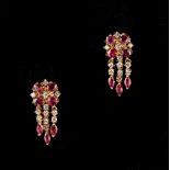 A pair of 18ct yellow gold ruby & diamond cluster & tassel earrings, each with a cluster of four
