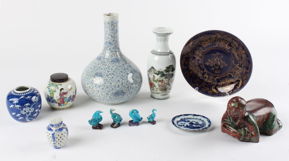 A quantity of Oriental ceramics, including a blue & white bottle vase, damage to rim & neck, 14.