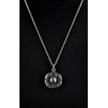 Property of a lady - a Georg Jensen sterling silver Moonlight (436) pendant necklace, set with