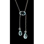 A 9ct white gold aquamarine necklace, of asymmetric design with two pendants of differing lengths,