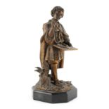 A late 19th / early 20th century French bronze figure of a street vendor, on octagonal black