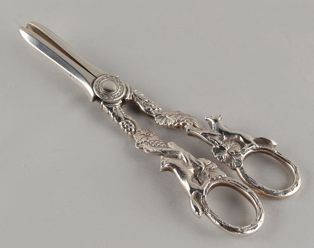 Property of a deceased estate - a pair of silver grape scissors, the handles cast as foxes &