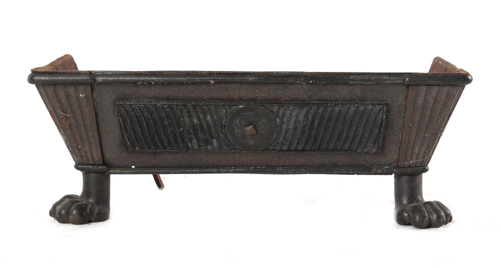 Property of a lady - a Regency style iron fire basket, with paw feet, 20.2ins. (51.3cms.) wide;