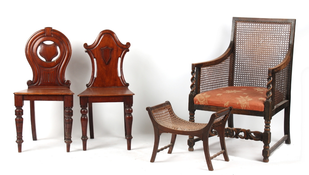 Property of a lady - two Victorian mahogany hall chairs; together with an early 20th century cane