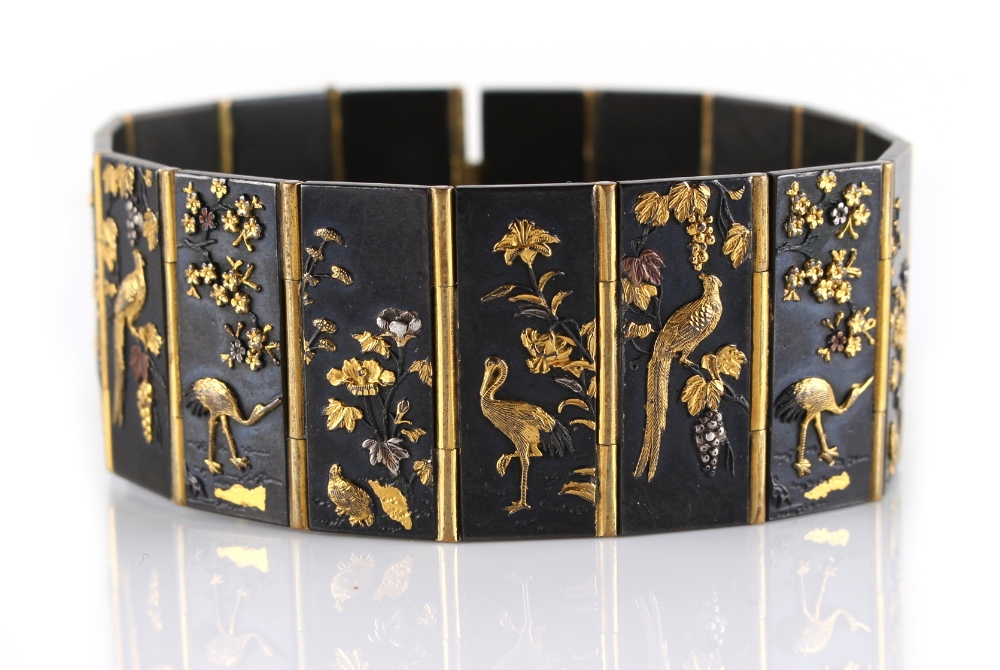 A good Japanese Komei style bronze & shakudo mixed metal panel bracelet, Meiji period (1868-1912),