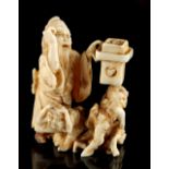 The Ronald Hart Collection of Japanese Netsukes - a carved ivory netsuke modelled as a standing