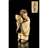 The Ronald Hart Collection of Japanese Netsukes - a carved ivory netsuke modelled as a standing