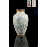Property of a lady - an early 20th century Japanese porcelain vase with low relief moulded & painted