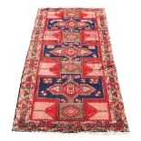 An Ardebil woollen hand-made runner with geometric design, 126 by 57ins. (320 by 145cms.) (see