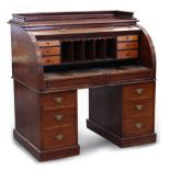 Property of a gentleman - a Victorian mahogany roll-top desk, 48ins. (122cms.) wide (see