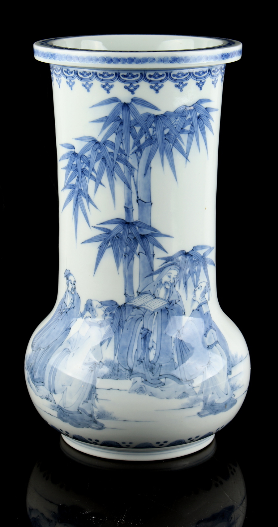 A Japanese Hirado blue & white vase, Meiji period (1868-1912), painted with figures standing by