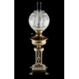 An Edwardian brass oil lamp modelled as a Greek garden temple, 26ins. (66cms.) high (overall) (see