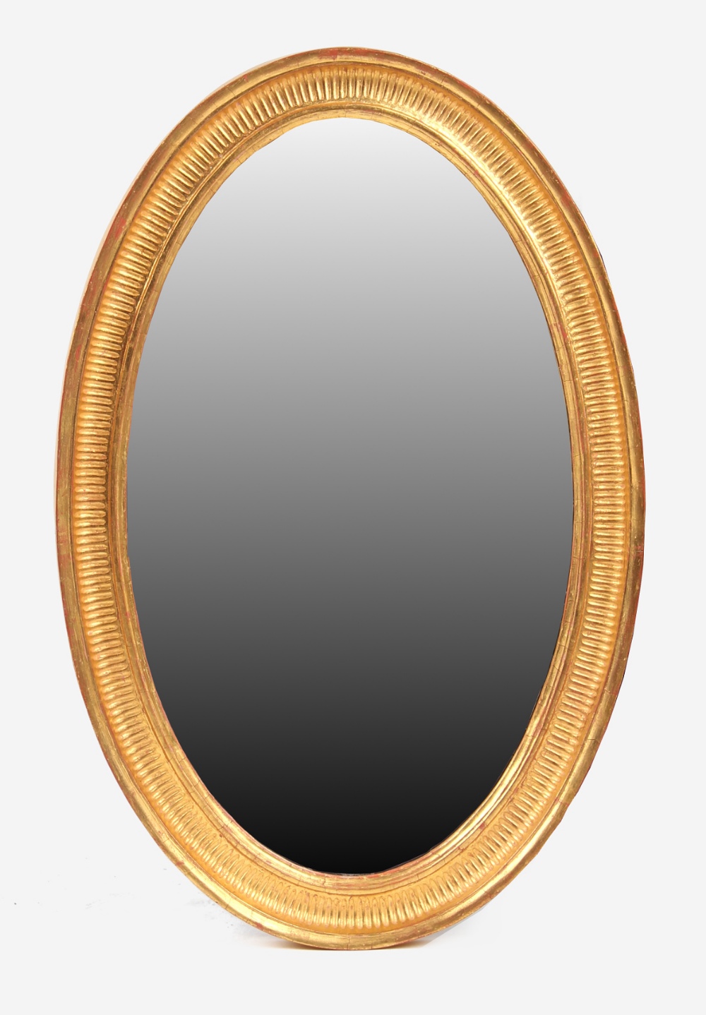 Property of a lady - an Edwardian gilt oval framed wall mirror, re-gilt, 31ins. (78.5cms.) high (see