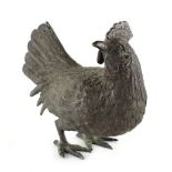 A bronze model of a chicken, probably Japanese, late 19th century, unsigned, 5.9ins. (15cms.)