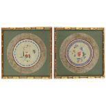 A pair of Chinese embroidered silk roundels depicting butterflies & flowers, 20th century, in