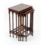 Property of a lady - a nest of four early 20th century oak rectangular topped occasional tables,