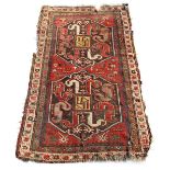 Property of a gentleman - an antique Karabagh Chondzoresk rug, damages, 85 by 51ins. (216 by